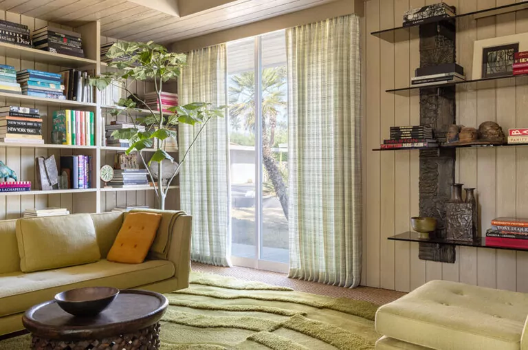 Living room curtain ideas include subtly patterned drapes like Desert Tweed in Bluebell in a vintage room