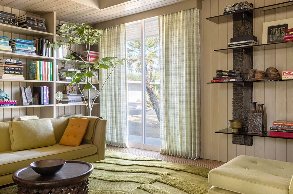Living room curtain ideas include subtly patterned drapes like Desert Tweed in Bluebell in a vintage room