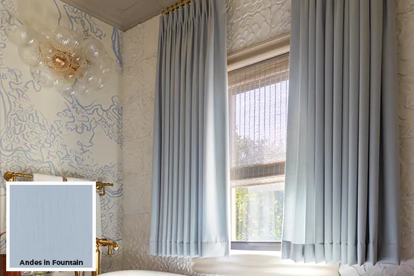 An ornate bathroom has sill-length curtains vs drapes that are floor-length, made of Andes in Fountain
