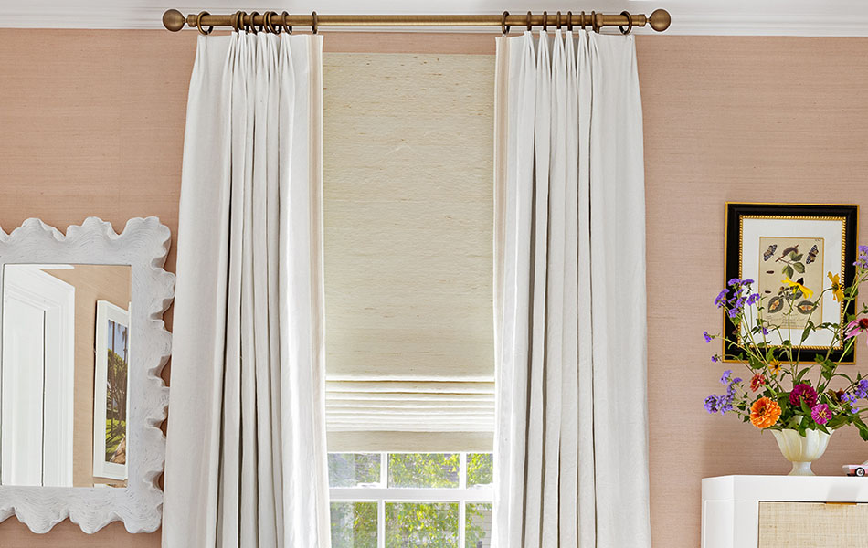A child's room features kids curtains made of Linen in Ivory with blackout lining, paired with a woven shade for texture