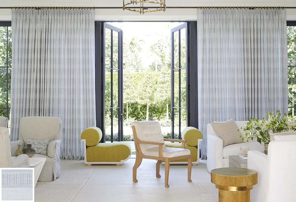 Glass doors open to let the outside in with tailored pleat drapes on either side showcase curtain ideas for living rooms