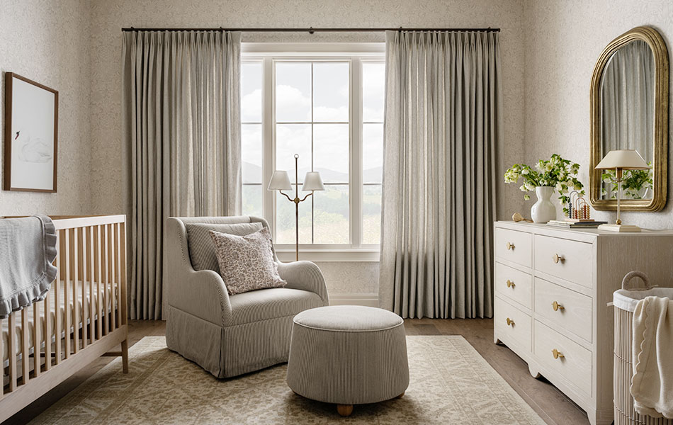 Nursery curtains made of Windsor Stripe in Taupe offer subtle visual interest to a modern nursery filled with soft neutrals