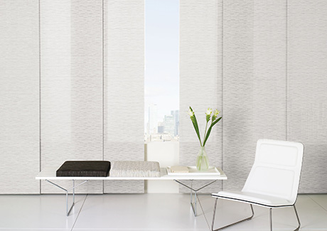 Types of blinds include Vertical Blinds made of Chilewich Bamboo in Chalk in a small minimalist sitting area