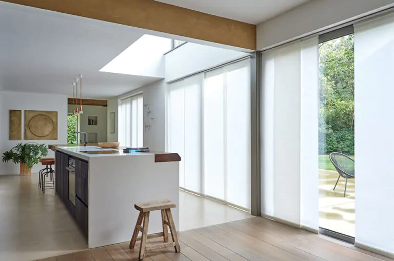 A mid-century modern kitchen shows the result of learning how to install vertical blinds of Park in Winter on a panel track