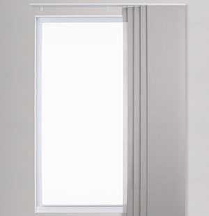 A product image shows panels of a vertical blinds system stacked to the right of a window so that they can be drawn left