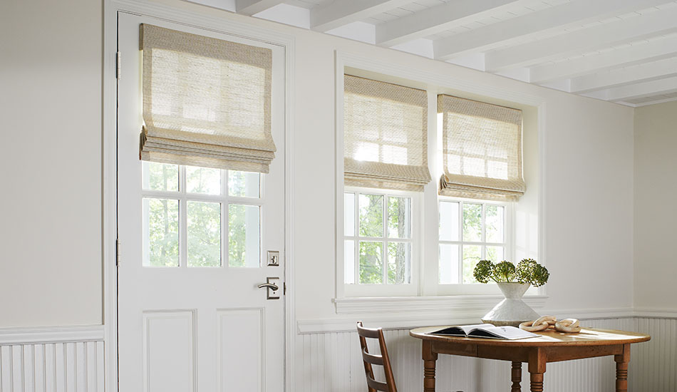 Pull down window shades in the Woven Wood Shade style made of Grassweave, Hemp, complement warm white walls and wood table