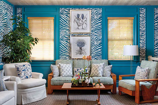 Wood Blinds made of 2-inch Bamboo in Natural offer a light honey-colored wood tone to a turquoise, tropical-inspired room