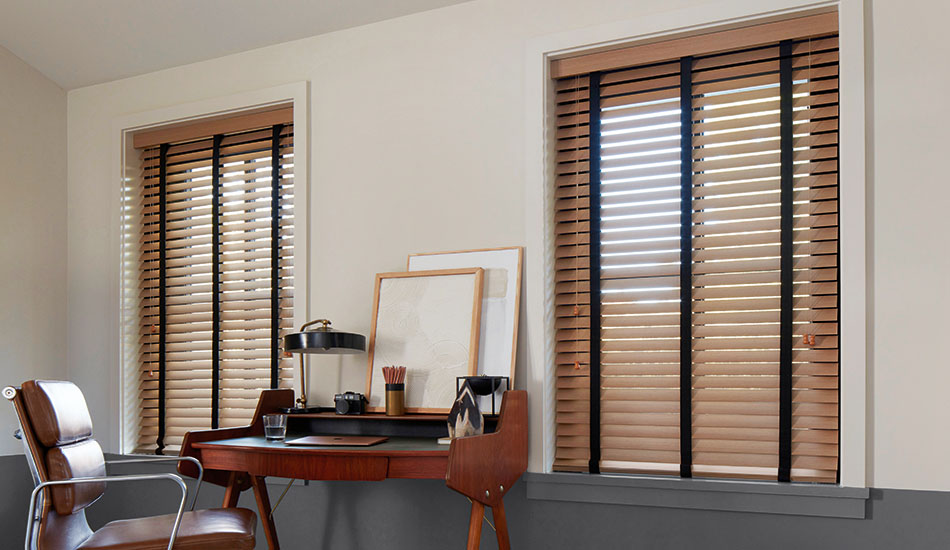 Types of blinds include Wood Blinds made of 2-inch Exotic in Oak with decorative tape in Black in a mid-century modern office
