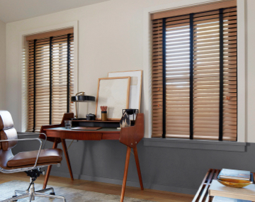 2 Inch Oak Wood Blinds hung over windows in an office with a centered wooden desk and brown office chair