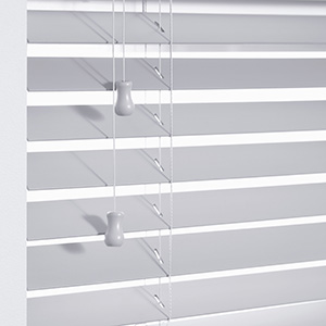 A product image of Wood Blinds with a cord lock control system shows the braided cords and control cords